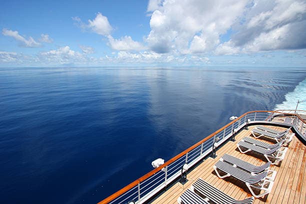 Cruise ship deck with lounge chairs